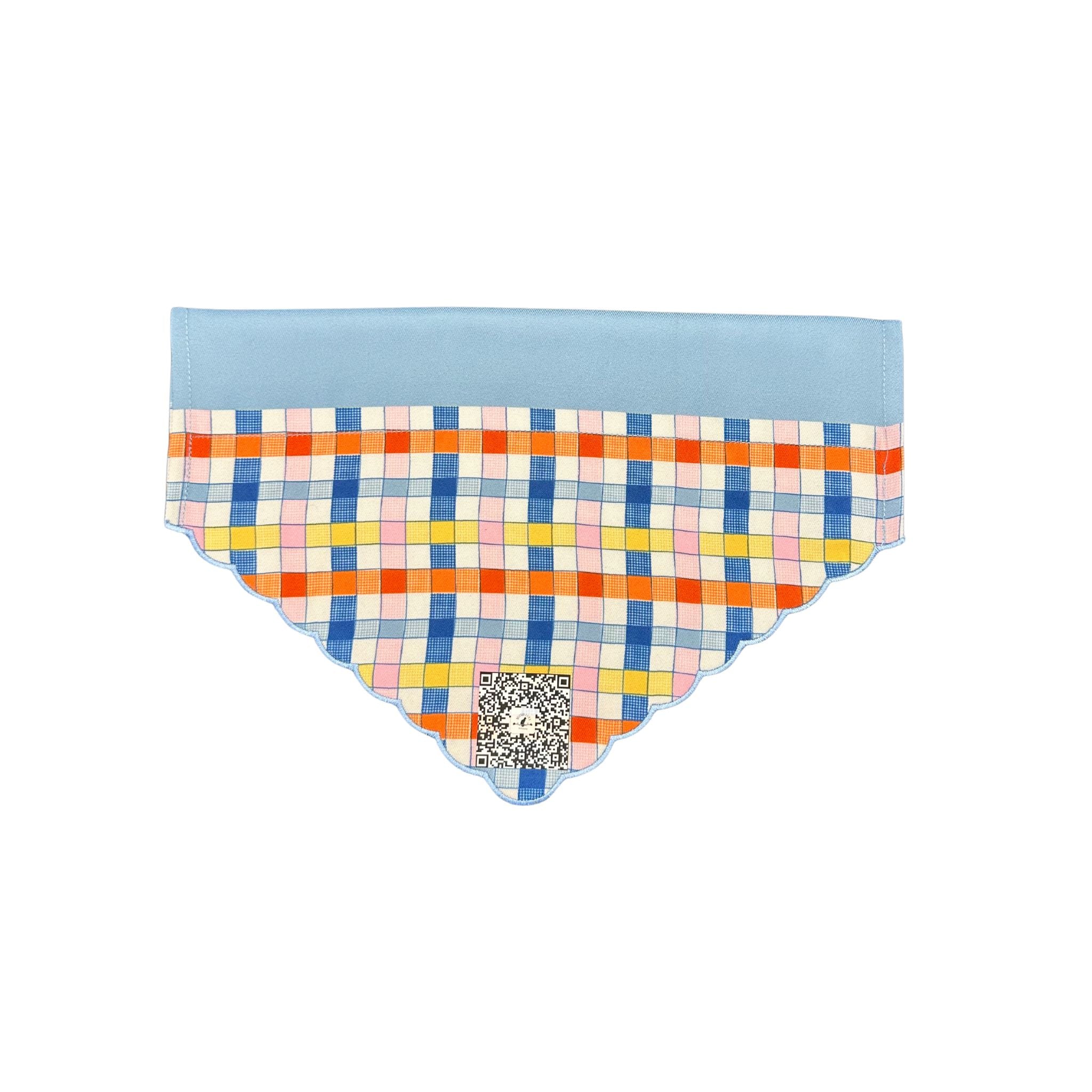 Front view of the "Checkered Chic" dog bandana, showcasing its light blue top where the dog collar goes through and the vibrant multi-colored checkered pattern with Beloved Lily's QR code.