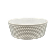 All-White Ceramic Dog Bowl with ridged surface and heavy base. Side of Dog Bowl.