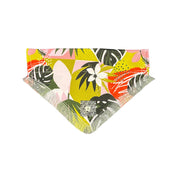 Front view of the "Tropical Paradise" Hawaiian dog bandana, showcasing its lush green background with black leaves, pink and white flowers, and Beloved Lily's QR code.