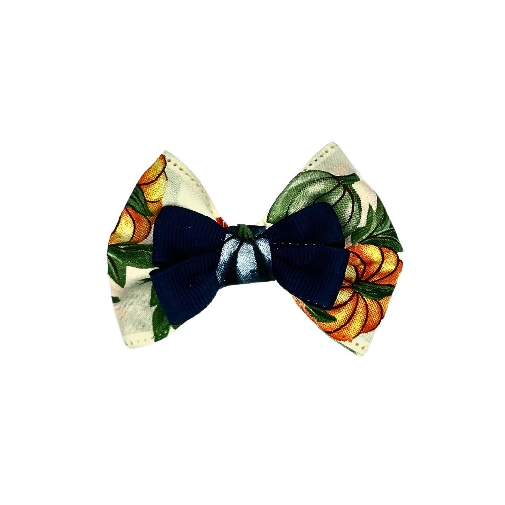 Navy and floral citrus cat collar bow featuring a bold navy grosgrain bow and orange fruit accents. Handcrafted pet accessory by Beloved Lily's Pet Company.