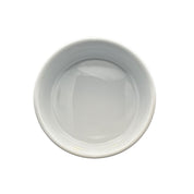 All-White Ceramic Dog Bowl with ridged surface and heavy base. Above View photo of dog bowl.