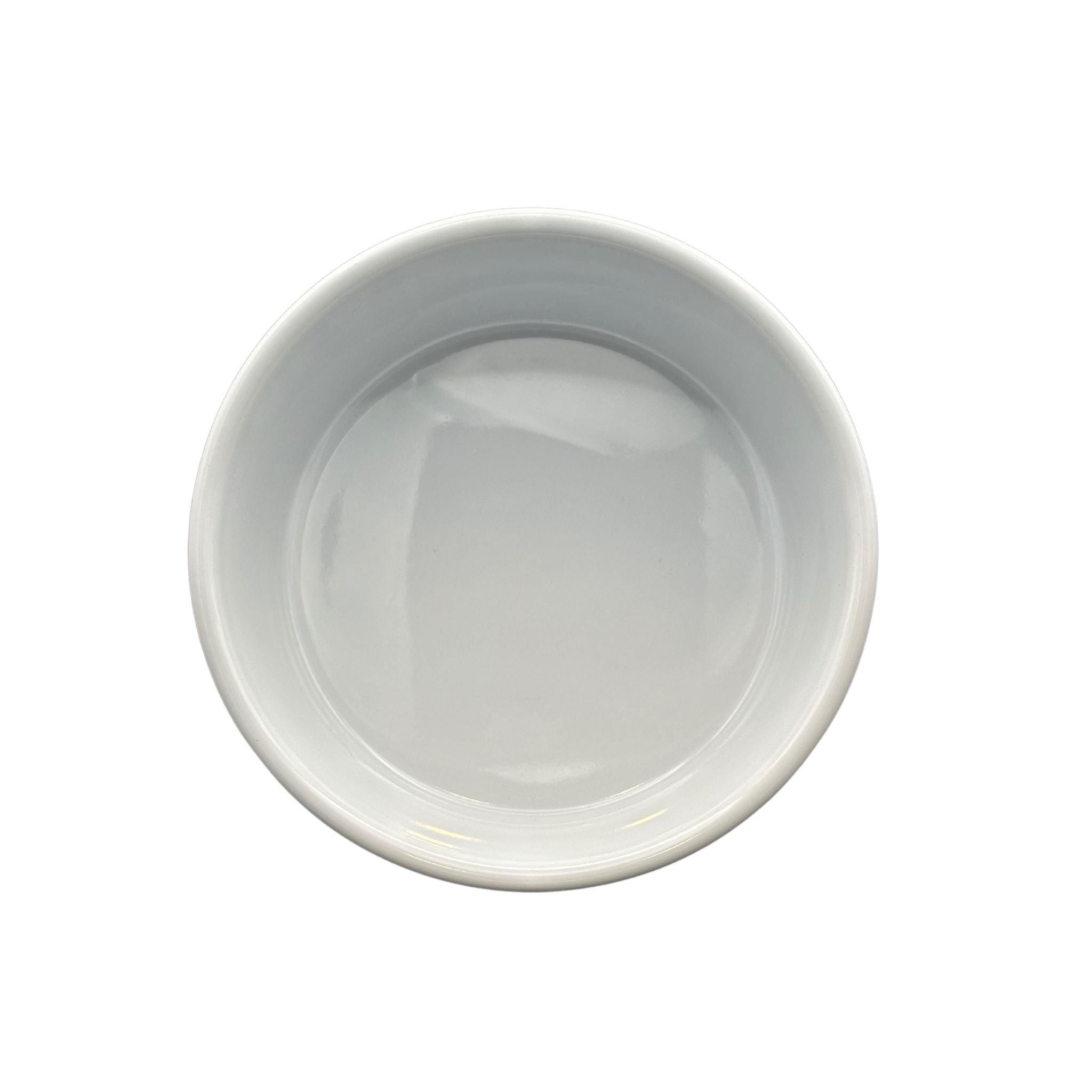 All-White Ceramic Dog Bowl with ridged surface and heavy base. Above View photo of dog bowl.