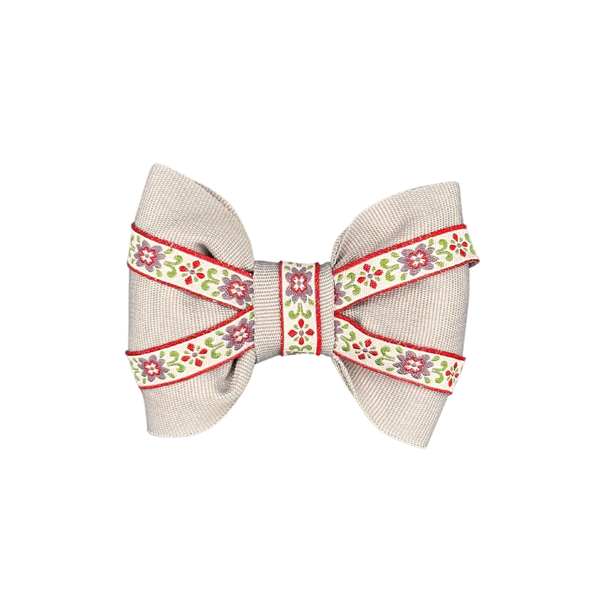 “Elegant Floral Dog Collar Bow with a light gray base, accented by a soft purple hue and delicate floral patterns, perfect for adding a touch of sophistication to your dog’s style.”