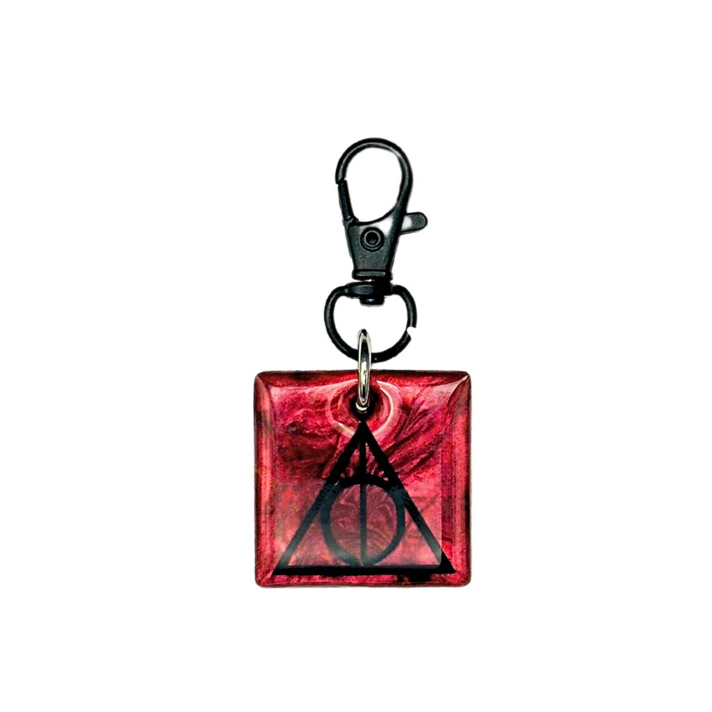 Square-shaped pet ID tag made of resin with a triangle symbol design, featuring a customizable QR code.