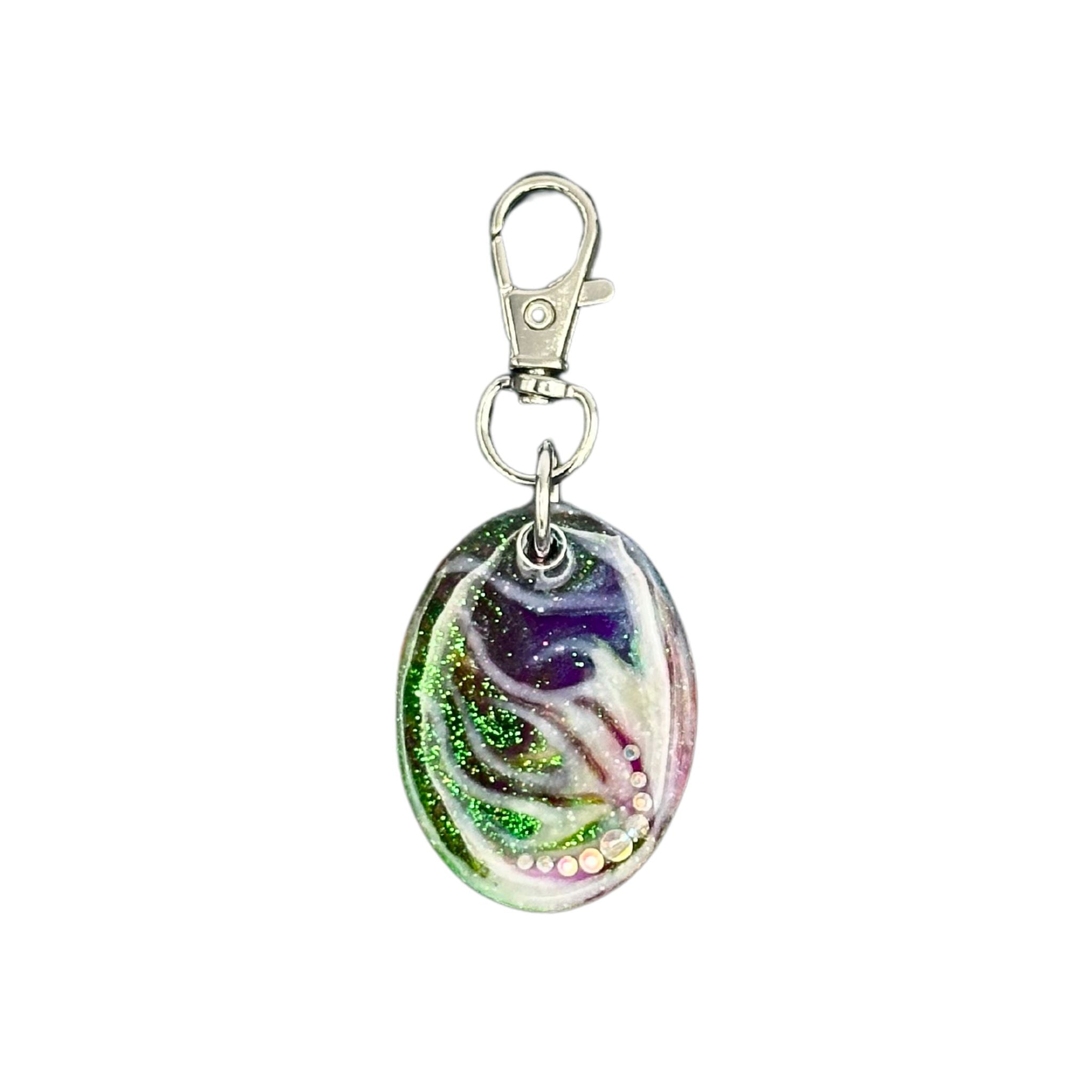 Radiant glow-in-the-dark oval pet ID tag with a QR code, showcasing an array of vibrant colors by day and glowing at night, front and back views.